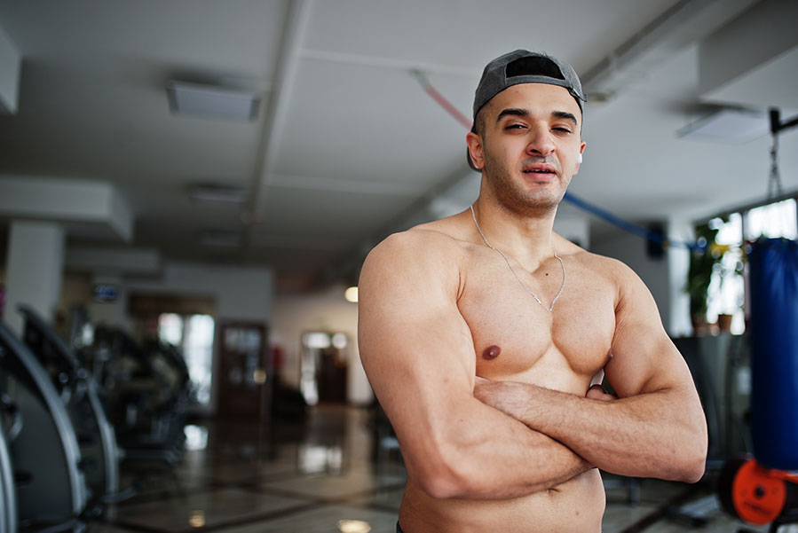 fit-and-muscular-arabian-man-posing-in-gym